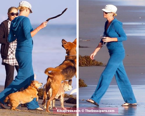 charlize1 charlize1 Charlize Theron gioca con i suoi cani