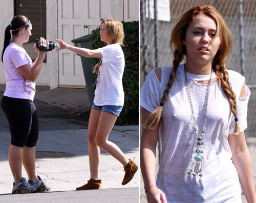 miley infastidita Miley Cyrus si scontra con una paparazza