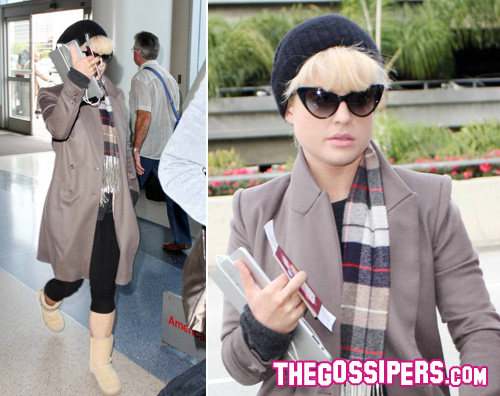 kelly ipad Kelly Osbourne in aeroporto con liPad