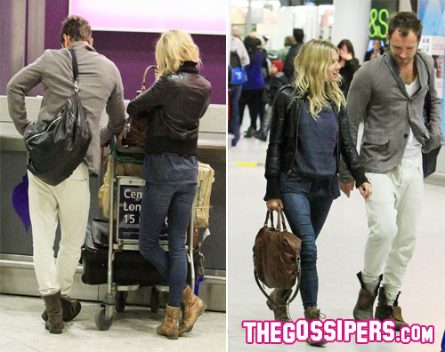 kikapress41 Jude Law e Sienna Miller in attesa... dei bagagli!