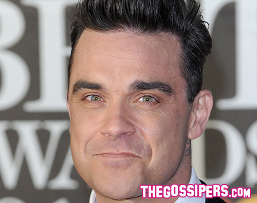 Robbie Williams Robbie William nudo per Under The Radar