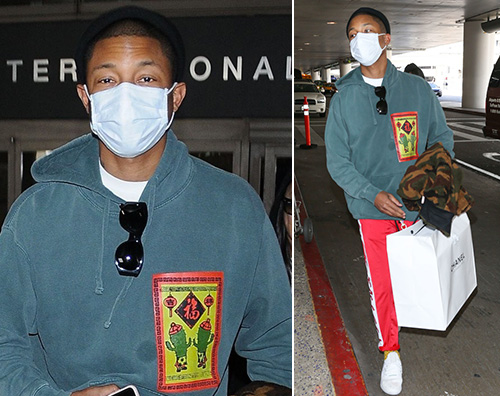 Pharrell Williams Pharrell Williams viaggia con la mascherina