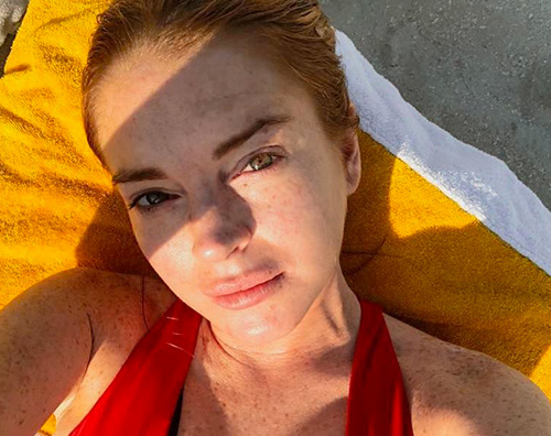 lindsay lohan Lindsay Lohan, relax al sole e bufera in famiglia