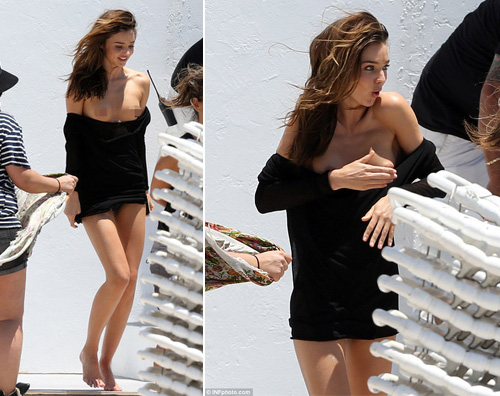 mirandastrip Miranda Kerr fuori di seno sul set di un servizio fotografico